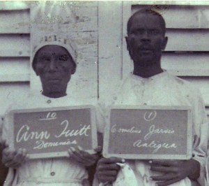 Image of Ann Tuitt and Cornelius Jarvis. Part of a larger photograph of people serving prison sentences for obeah in the Antigua prison, 1905. TNA CO 152/287. Courtesy of The National Archives, UK