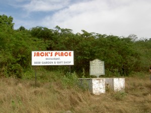 Jack Mansong Roadside Marker and advertisement for 'Jack's Place', St. Thomas, Jamaica